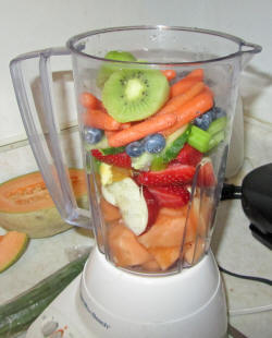 Fruits and Vegetables in Blender Photo